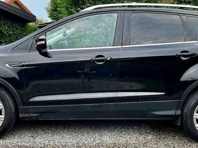 Черный Форд Эскейп, объемом двигателя 2 л и пробегом 134 тыс. км за 8400 $, фото 5 на Automoto.ua