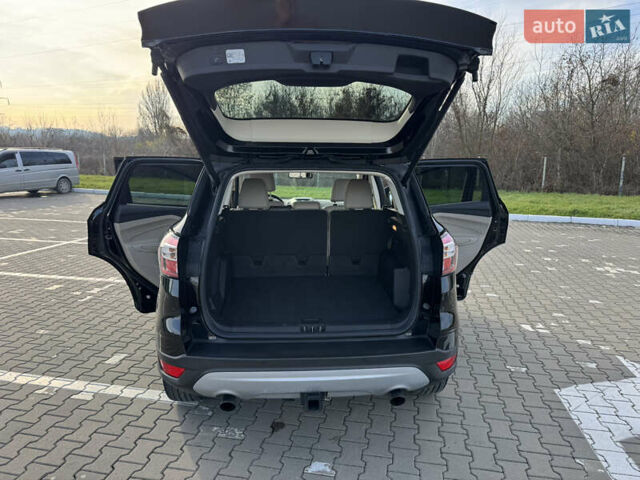 Черный Форд Эскейп, объемом двигателя 2 л и пробегом 33 тыс. км за 17000 $, фото 24 на Automoto.ua