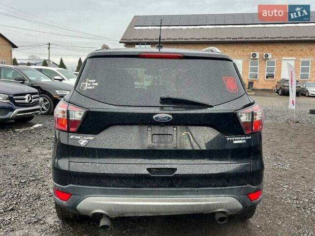 Черный Форд Эскейп, объемом двигателя 2 л и пробегом 194 тыс. км за 9600 $, фото 5 на Automoto.ua