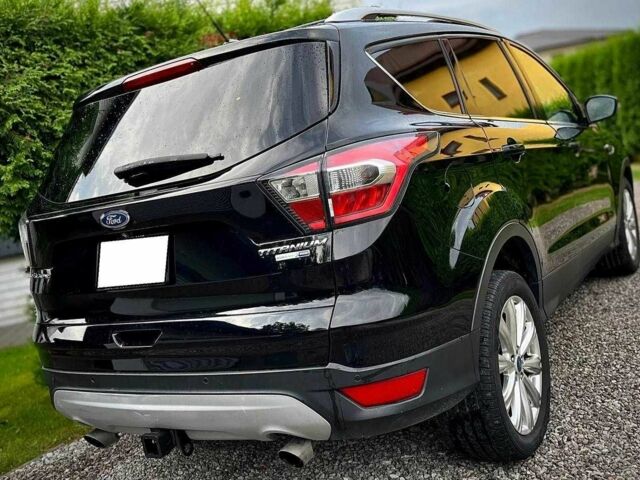 Черный Форд Эскейп, объемом двигателя 2 л и пробегом 134 тыс. км за 8400 $, фото 2 на Automoto.ua