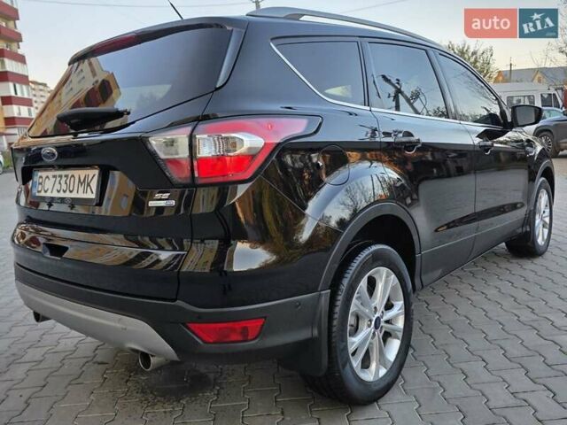 Черный Форд Эскейп, объемом двигателя 1.5 л и пробегом 106 тыс. км за 10999 $, фото 3 на Automoto.ua