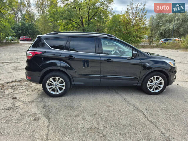 Черный Форд Эскейп, объемом двигателя 1.5 л и пробегом 191 тыс. км за 10000 $, фото 1 на Automoto.ua
