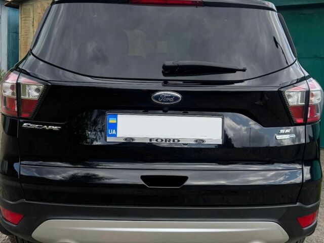 Чорний Форд Ескейп, об'ємом двигуна 1.5 л та пробігом 77 тис. км за 14000 $, фото 1 на Automoto.ua