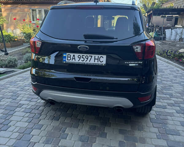 Чорний Форд Ескейп, об'ємом двигуна 2 л та пробігом 76 тис. км за 15900 $, фото 4 на Automoto.ua