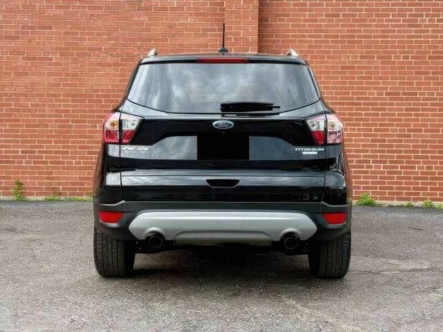 Черный Форд Эскейп, объемом двигателя 2 л и пробегом 99 тыс. км за 3500 $, фото 5 на Automoto.ua