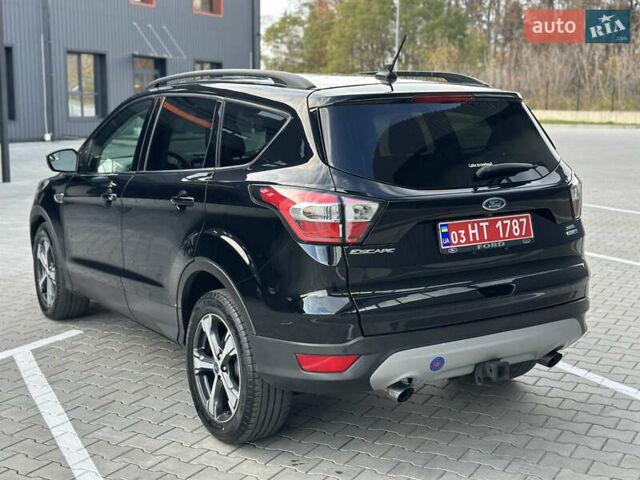 Черный Форд Эскейп, объемом двигателя 1.5 л и пробегом 142 тыс. км за 12990 $, фото 4 на Automoto.ua