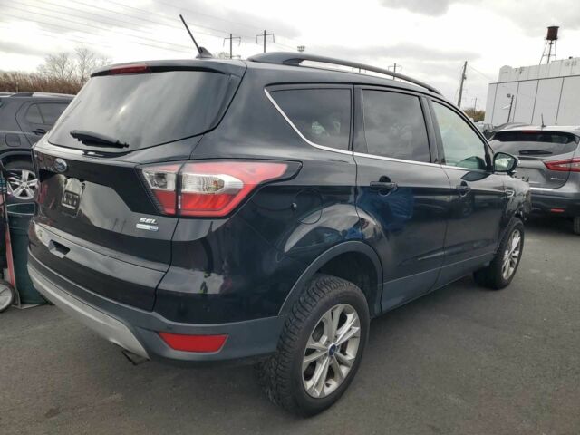 Черный Форд Эскейп, объемом двигателя 1.5 л и пробегом 140 тыс. км за 8000 $, фото 2 на Automoto.ua