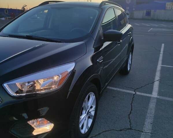 Черный Форд Эскейп, объемом двигателя 1.5 л и пробегом 119 тыс. км за 14500 $, фото 1 на Automoto.ua