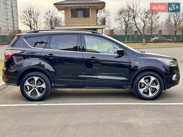 Черный Форд Эскейп, объемом двигателя 1.5 л и пробегом 143 тыс. км за 12999 $, фото 7 на Automoto.ua