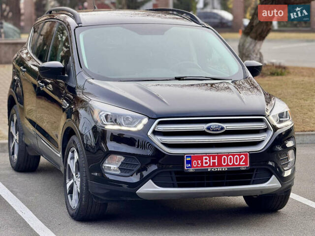 Черный Форд Эскейп, объемом двигателя 1.5 л и пробегом 143 тыс. км за 12999 $, фото 2 на Automoto.ua