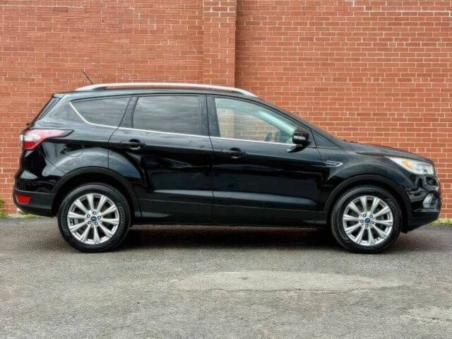 Черный Форд Эскейп, объемом двигателя 2 л и пробегом 99 тыс. км за 3500 $, фото 3 на Automoto.ua