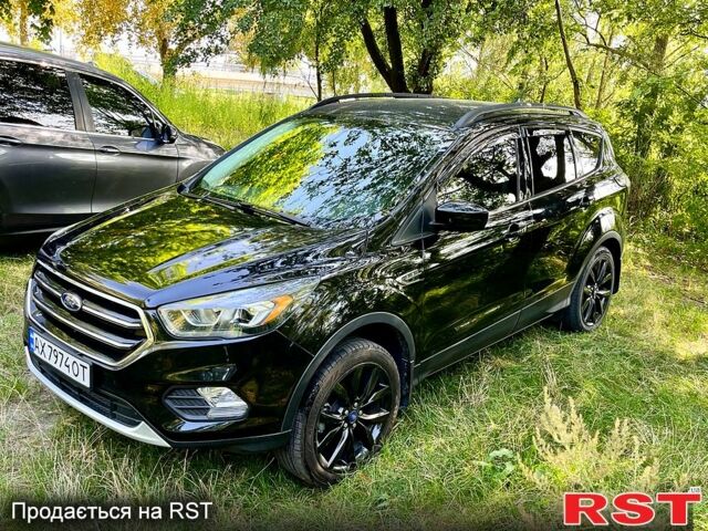 Черный Форд Эскейп, объемом двигателя 1.5 л и пробегом 207 тыс. км за 11550 $, фото 1 на Automoto.ua