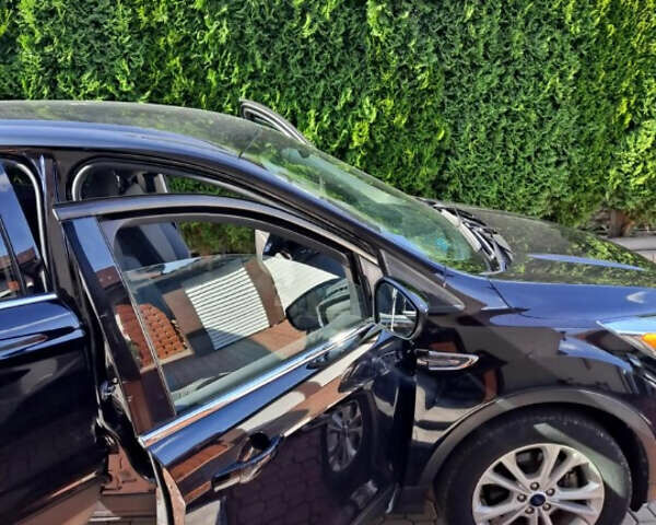 Чорний Форд Ескейп, об'ємом двигуна 1.5 л та пробігом 145 тис. км за 12000 $, фото 3 на Automoto.ua