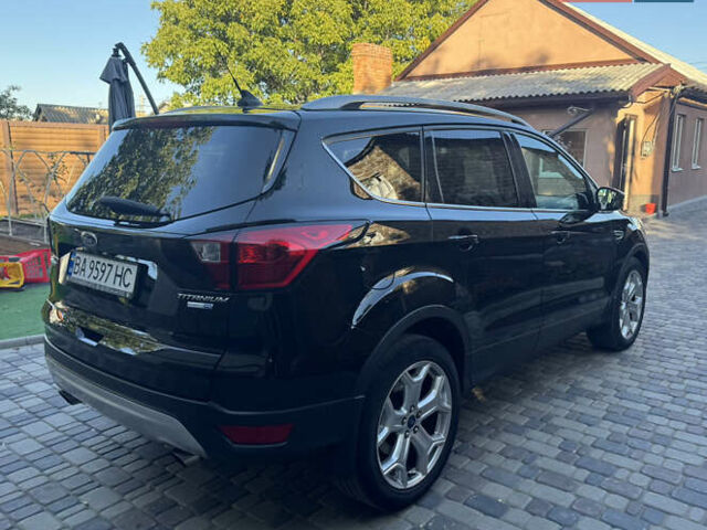 Чорний Форд Ескейп, об'ємом двигуна 2 л та пробігом 76 тис. км за 15900 $, фото 3 на Automoto.ua