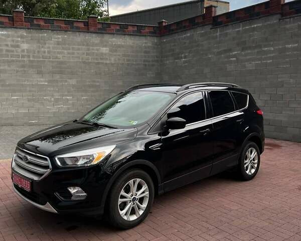 Чорний Форд Ескейп, об'ємом двигуна 1.5 л та пробігом 165 тис. км за 13100 $, фото 4 на Automoto.ua