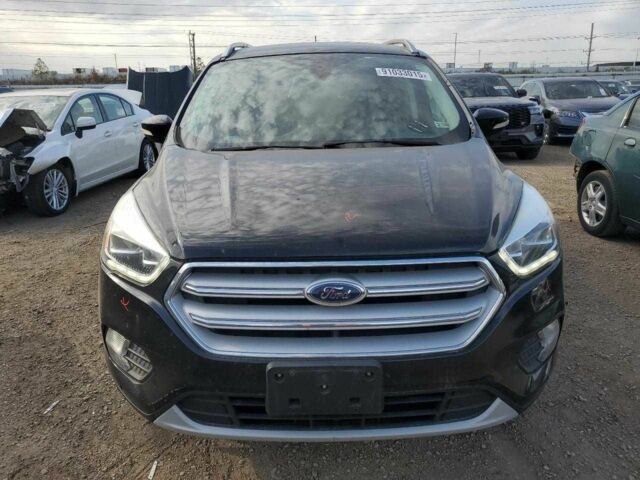 Черный Форд Эскейп, объемом двигателя 2 л и пробегом 77 тыс. км за 2800 $, фото 1 на Automoto.ua