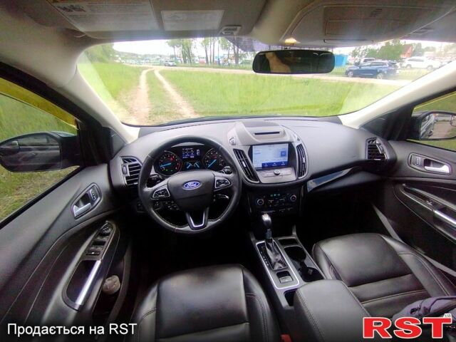 Черный Форд Эскейп, объемом двигателя 1.5 л и пробегом 207 тыс. км за 11550 $, фото 6 на Automoto.ua