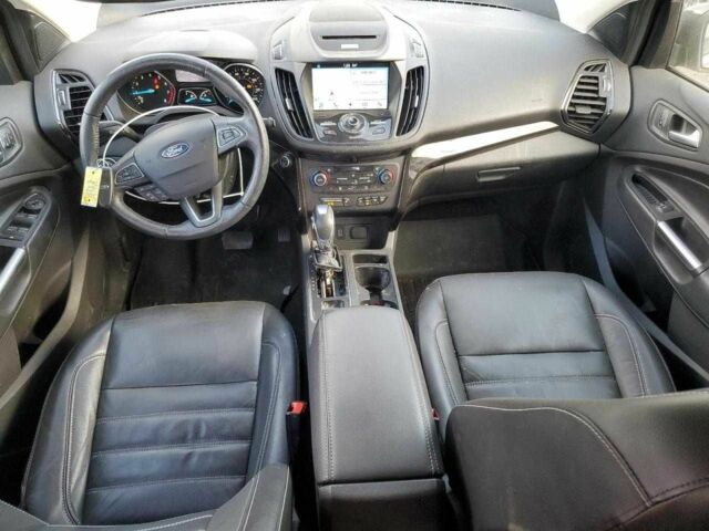 Черный Форд Эскейп, объемом двигателя 2 л и пробегом 77 тыс. км за 2800 $, фото 7 на Automoto.ua