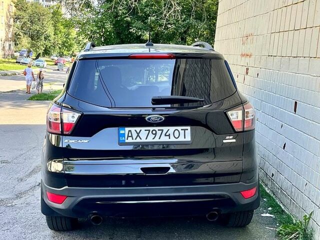 Черный Форд Эскейп, объемом двигателя 1.5 л и пробегом 207 тыс. км за 11550 $, фото 3 на Automoto.ua