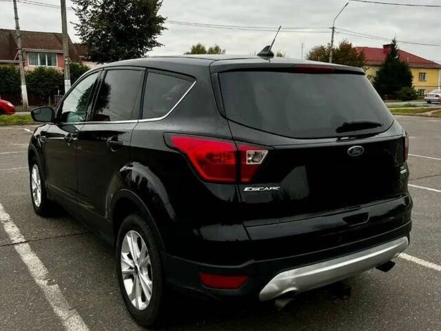 Черный Форд Эскейп, объемом двигателя 2 л и пробегом 88 тыс. км за 10000 $, фото 4 на Automoto.ua