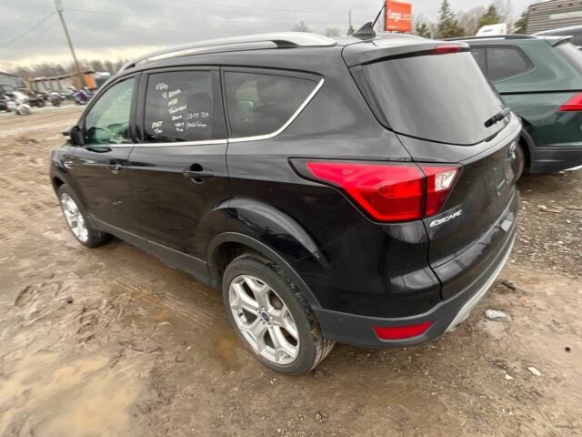 Черный Форд Эскейп, объемом двигателя 2 л и пробегом 115 тыс. км за 9900 $, фото 3 на Automoto.ua