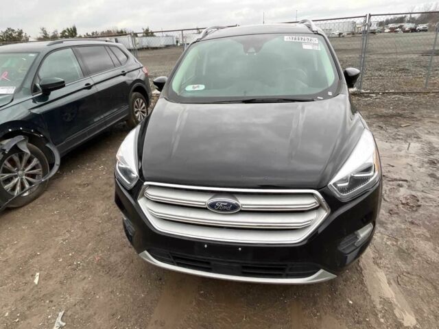 Черный Форд Эскейп, объемом двигателя 2 л и пробегом 115 тыс. км за 9900 $, фото 1 на Automoto.ua