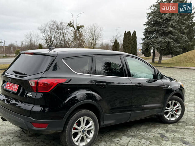 Черный Форд Эскейп, объемом двигателя 1.5 л и пробегом 214 тыс. км за 10000 $, фото 3 на Automoto.ua