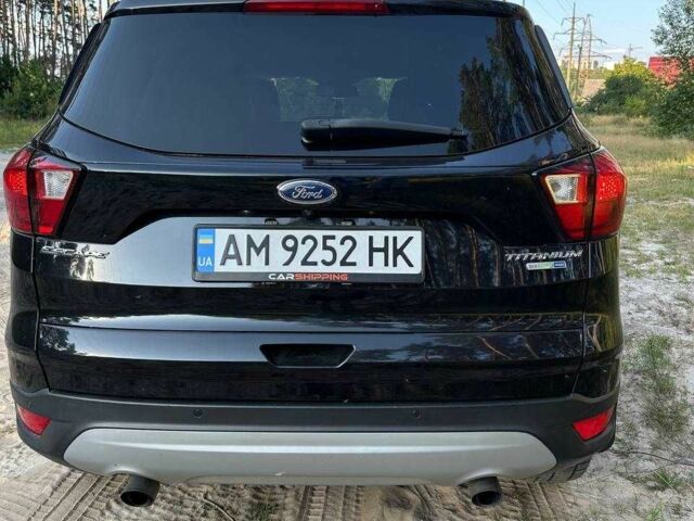 Черный Форд Эскейп, объемом двигателя 2 л и пробегом 126 тыс. км за 15000 $, фото 13 на Automoto.ua
