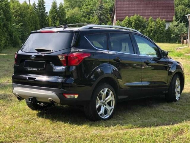 Черный Форд Эскейп, объемом двигателя 2 л и пробегом 50 тыс. км за 10500 $, фото 3 на Automoto.ua