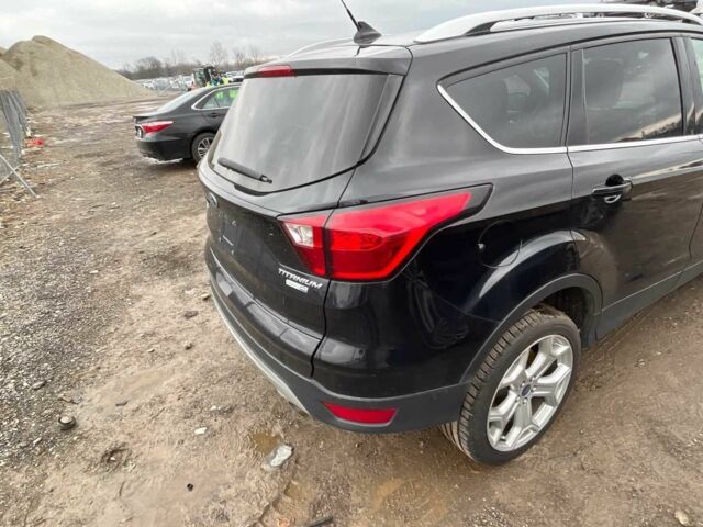 Черный Форд Эскейп, объемом двигателя 2 л и пробегом 115 тыс. км за 9900 $, фото 8 на Automoto.ua