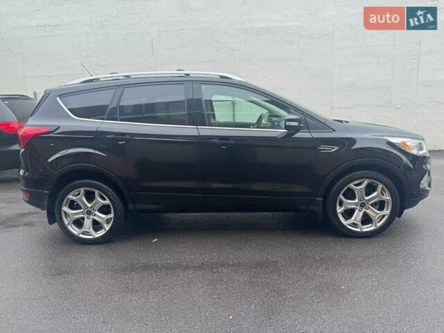 Черный Форд Эскейп, объемом двигателя 2 л и пробегом 100 тыс. км за 3000 $, фото 4 на Automoto.ua