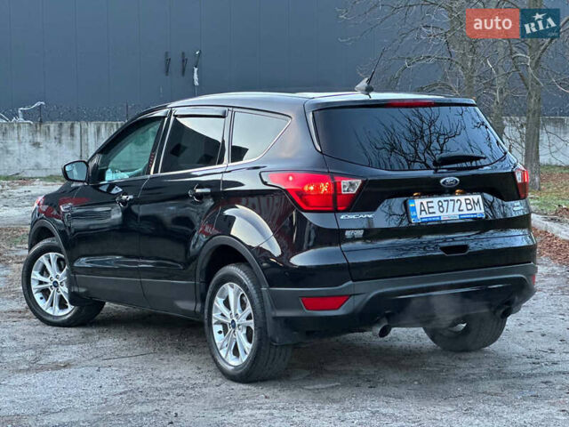 Чорний Форд Ескейп, об'ємом двигуна 1.5 л та пробігом 55 тис. км за 11700 $, фото 5 на Automoto.ua