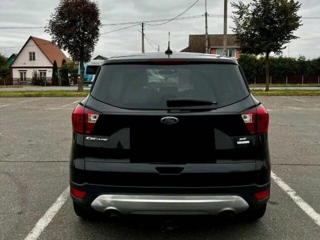 Черный Форд Эскейп, объемом двигателя 2 л и пробегом 88 тыс. км за 10000 $, фото 3 на Automoto.ua