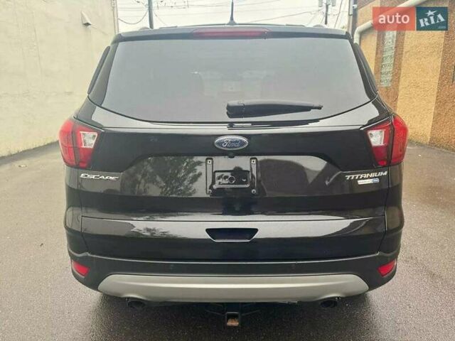 Черный Форд Эскейп, объемом двигателя 2 л и пробегом 100 тыс. км за 3000 $, фото 5 на Automoto.ua