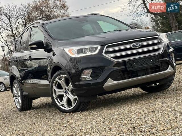 Черный Форд Эскейп, объемом двигателя 2 л и пробегом 137 тыс. км за 14999 $, фото 4 на Automoto.ua