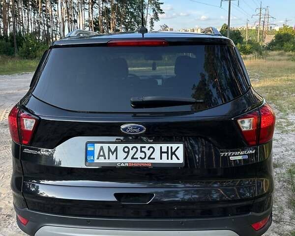 Черный Форд Эскейп, объемом двигателя 2 л и пробегом 126 тыс. км за 15600 $, фото 2 на Automoto.ua