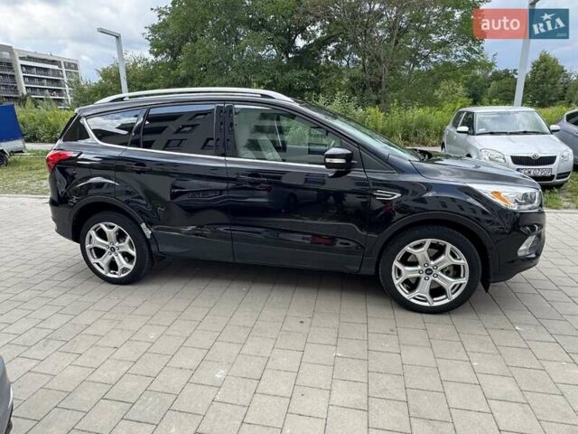Черный Форд Эскейп, объемом двигателя 2 л и пробегом 91 тыс. км за 15500 $, фото 5 на Automoto.ua