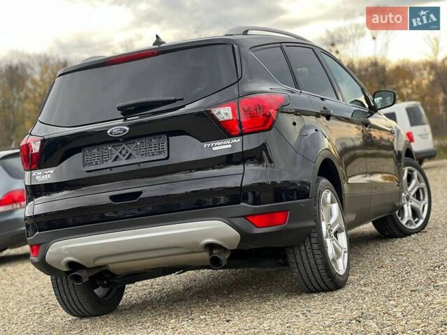 Черный Форд Эскейп, объемом двигателя 2 л и пробегом 137 тыс. км за 14999 $, фото 6 на Automoto.ua