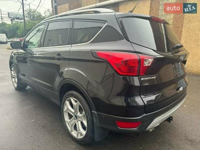 Черный Форд Эскейп, объемом двигателя 2 л и пробегом 100 тыс. км за 3000 $, фото 3 на Automoto.ua