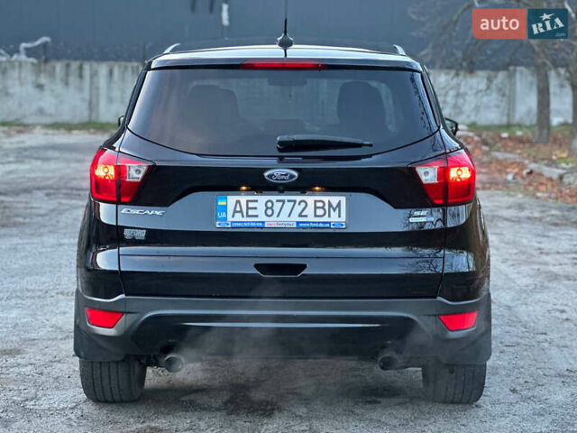 Чорний Форд Ескейп, об'ємом двигуна 1.5 л та пробігом 55 тис. км за 11700 $, фото 4 на Automoto.ua
