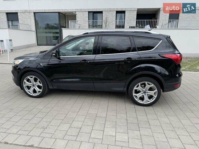 Черный Форд Эскейп, объемом двигателя 2 л и пробегом 91 тыс. км за 15500 $, фото 3 на Automoto.ua