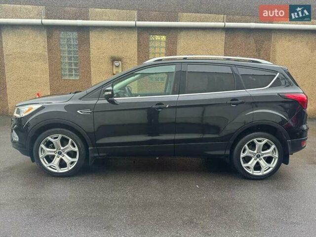 Черный Форд Эскейп, объемом двигателя 2 л и пробегом 100 тыс. км за 3000 $, фото 7 на Automoto.ua