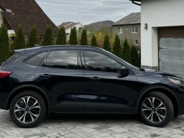 Черный Форд Эскейп, объемом двигателя 2 л и пробегом 74 тыс. км за 11000 $, фото 6 на Automoto.ua