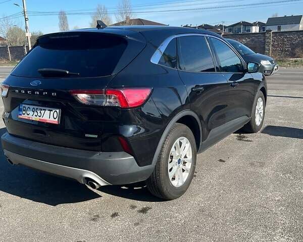 Чорний Форд Ескейп, об'ємом двигуна 1.5 л та пробігом 124 тис. км за 15000 $, фото 4 на Automoto.ua