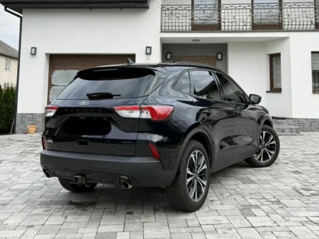 Черный Форд Эскейп, объемом двигателя 2 л и пробегом 74 тыс. км за 11000 $, фото 5 на Automoto.ua