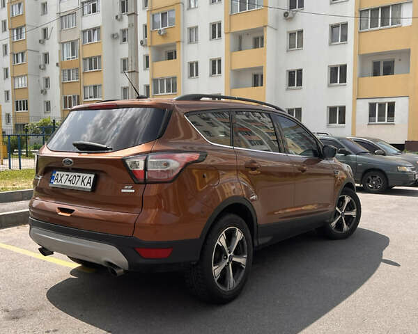 Коричневый Форд Эскейп, объемом двигателя 2 л и пробегом 131 тыс. км за 11500 $, фото 9 на Automoto.ua