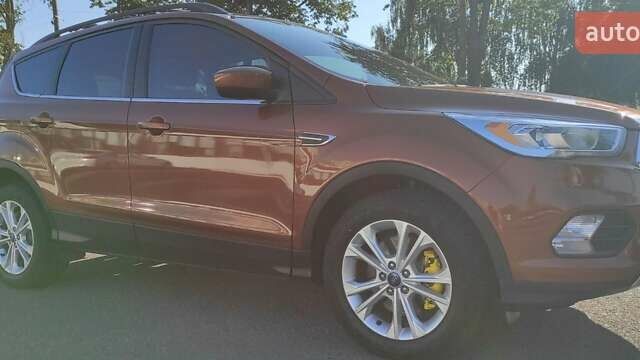 Коричневый Форд Эскейп, объемом двигателя 2 л и пробегом 140 тыс. км за 14000 $, фото 26 на Automoto.ua