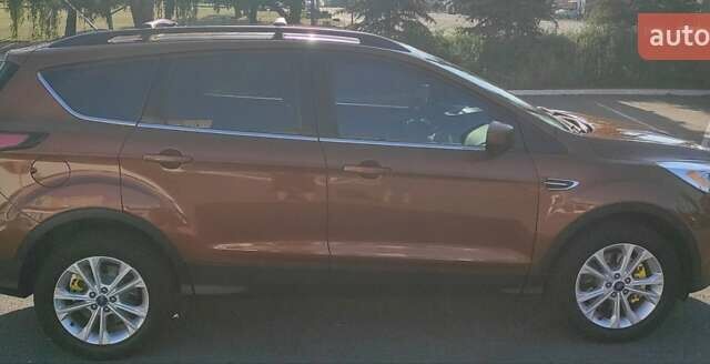 Коричневый Форд Эскейп, объемом двигателя 2 л и пробегом 140 тыс. км за 14000 $, фото 14 на Automoto.ua