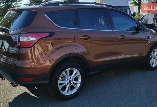 Коричневый Форд Эскейп, объемом двигателя 2 л и пробегом 140 тыс. км за 14000 $, фото 20 на Automoto.ua