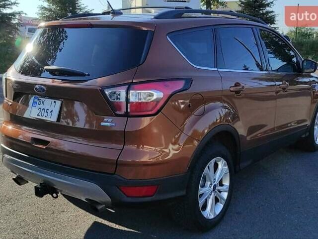 Коричневый Форд Эскейп, объемом двигателя 2 л и пробегом 140 тыс. км за 14000 $, фото 10 на Automoto.ua